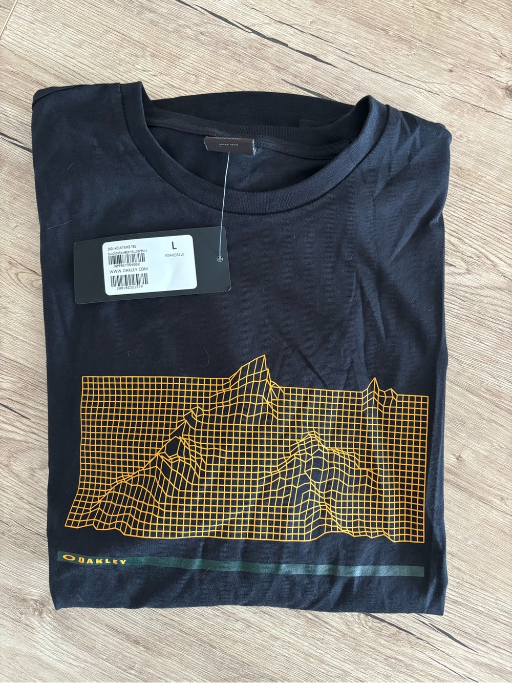 Oakley Black Short Sleeve Tee with Yellow Grid Mountain Graphic